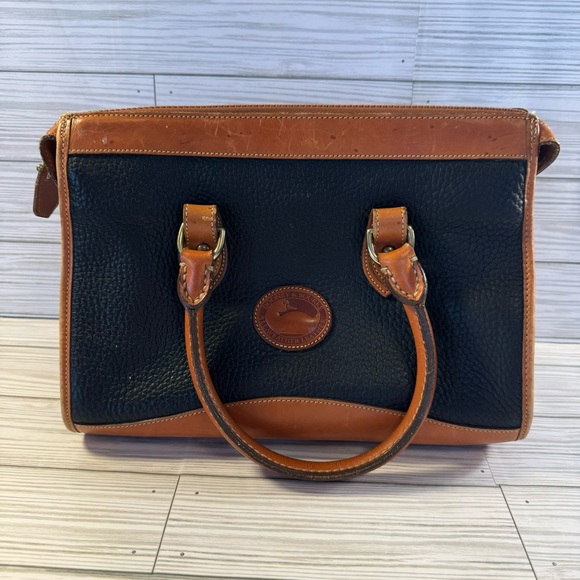 Dooney & Bourke Handbags - Vintage Dooney Bourke All Weather Leather Bowler Bag Purse Black and Brown